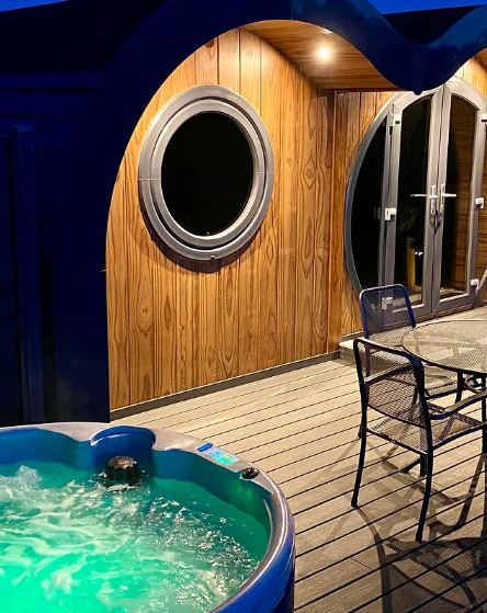 Ultra modern glamping pods with hot tub outside